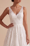 Robe longue de mariée blanche ligne A à col V avec broderie florale