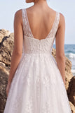 Robe longue de mariée blanche ligne A à col V avec broderie florale