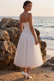 Robe de mariée midi blanche à col V glitter