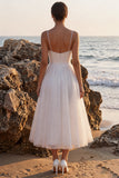 Robe de mariée midi blanche à col V glitter