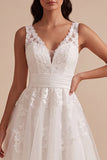 Robe de mariée midi blanche à col V avec appliqués floraux