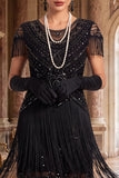 Robe vintage vintage à sequins noirs dorés à franges des années 1920 avec manches courtes