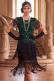 Robe vintage vintage à sequins noirs dorés à franges des années 1920 avec manches courtes
