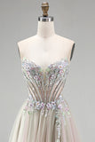 Robe de soirée longue rose poussiéreuse en tulle ligne A avec des appliqués floraux, un corset à strass et une fente
