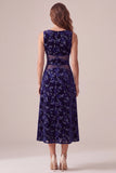 Robe de cocktail midi bleu marine ligne A en velours à col bateau avec imprimé floral et découpes