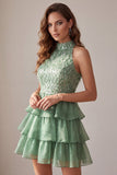 Robe cocktail courte verte à volants à niveaux avec franges