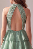 Robe cocktail courte verte à volants à niveaux avec franges