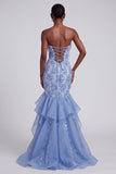 Robe de soirée longue bleue sirène en organza sans bretelles avec appliqués, volants et nœud