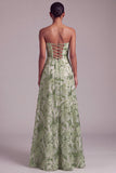Robe de soirée longue verte ligne A avec bustier, paillettes et dentelle au dos