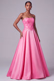 Robe de bal longue de bal en satin buster rose vif sans bretelles florales à sequins