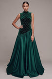 Robe en velours longue vert foncé ligne A en velours et satin avec fronces