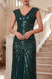 Robe des années 1920 vert foncé à col V avec paillettes, fourreau en mousseline