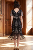 Robe des années 1920 à manches courtes abricot à col V avec paillettes et franges