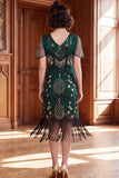Robe des années 1920 à manches courtes abricot à col V avec paillettes et franges