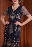 Robe des années 1920 à manches courtes abricot à col V avec paillettes et franges