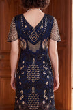 Robe des années 1920 à manches courtes abricot à col V avec paillettes et franges