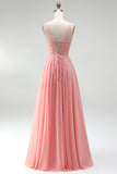 Robe de soirée longue rose ligne A à appliqués floraux, corset transparent, perlée, en mousseline et avec fente