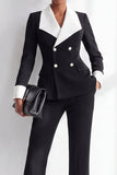 Costume pour femme noir et blanc à larges revers contrastants, boutonnage croisé et poches