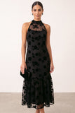 Robe invitée mariage midi noire ligne A, à encolure tour de cou, détails floraux, effet illusion et en tulle