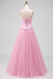 Robe de soirée longue rose ligne A en tulle brodé et perlée sans bretelles