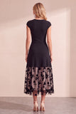 Robe de mariage midi en tulle noir à col rond