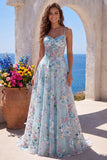 Robe de soirée longue bleue ligne A, à corset transparent, broderie florale et fines bretelles