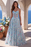 Robe de soirée longue bleue ligne A, à corset transparent, broderie florale et fines bretelles