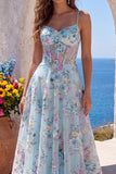 Robe de soirée longue bleue ligne A, à corset transparent, broderie florale et fines bretelles