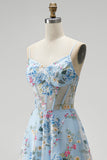 Robe de soirée longue bleue ligne A, à corset transparent, broderie florale et fines bretelles