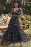 Robe d'invitée de mariage champagne tulle brodé col V manches fluides imprimé floral