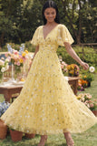 Robe d'invitée de mariage champagne tulle brodé col V manches fluides imprimé floral