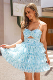 Robe de cocktail trapèze bleue à fleurs découpées courtes