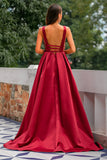 Robe de bal en satin bordeaux