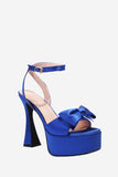 Sandales à talons hauts rose vif avec nœud
