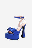 Sandales à talons hauts rose vif avec nœud