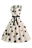 Robe à pois bleu clair vintage des années 50