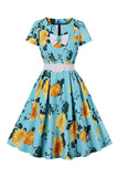 Robe vintage à manches courtes imprimée fleur bleue