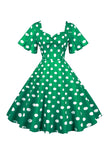 Robe vintage blanche à pois avec manches courtes