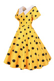 Robe vintage jaune à pois avec manches courtes