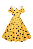 Robe vintage jaune à pois avec manches courtes