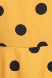 Robe vintage jaune à pois avec manches courtes