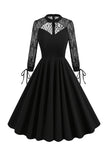 Robe vintage en dentelle à manches longues noires