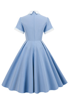 Robe vintage bleu clair des années 50 avec manches