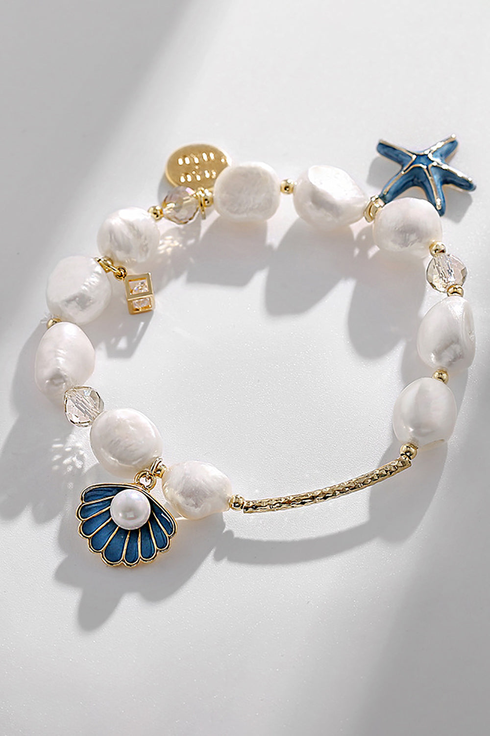 Bracelet perle d’étoile de mer à coquille bleue
