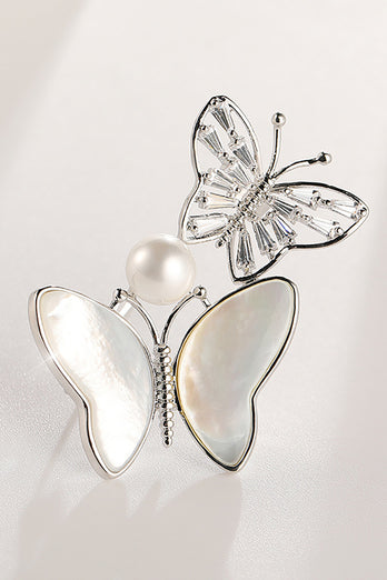 Broche papillon coquille