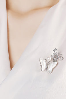 Broche papillon coquille