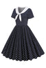 Charger l&#39;image dans la galerie, Robe à pois noir et blanc vintage des années 50 avec nœud papillon