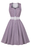 Robe à pois violet des années 50 avec ceinture