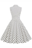 Robe à revers à pois blanc des années 50