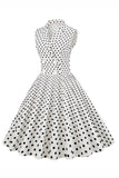 Robe à revers à pois blanc des années 50